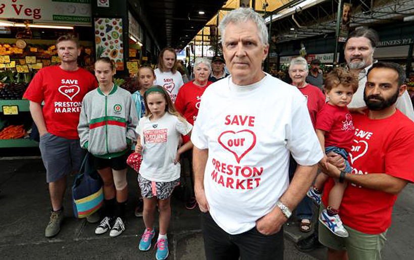 Save Our Preston Market community group spokesman Chris Erlandsen with other members at the market in Melbourne’s northern suburbs. Picture: David Geraghty
