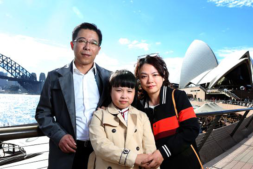 Jason Liu and Mary Xuan with their daughter Kelly Liu, from Shanghai. Picture: James Croucher
