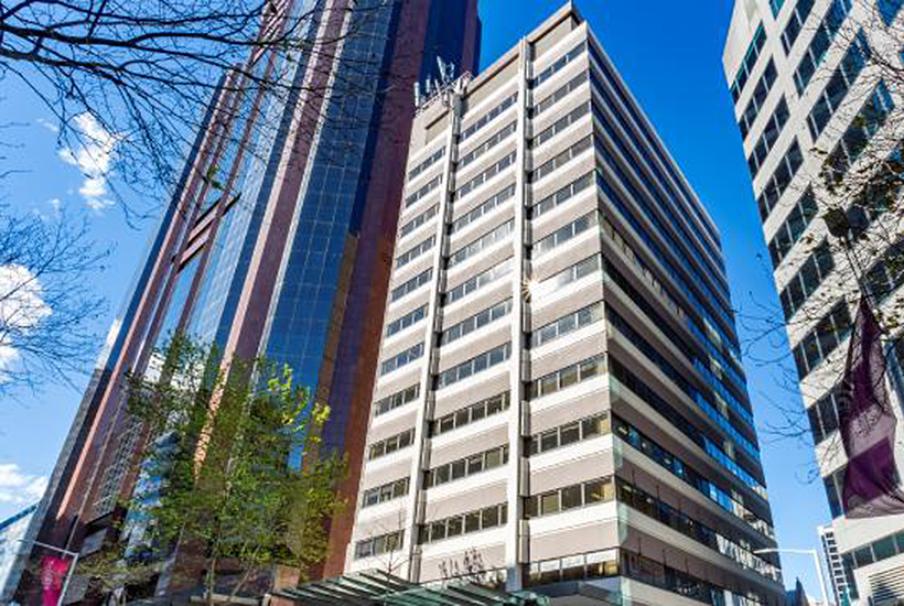 A private Asian group has swooped on an office tower in North Sydney for close to $52m.
