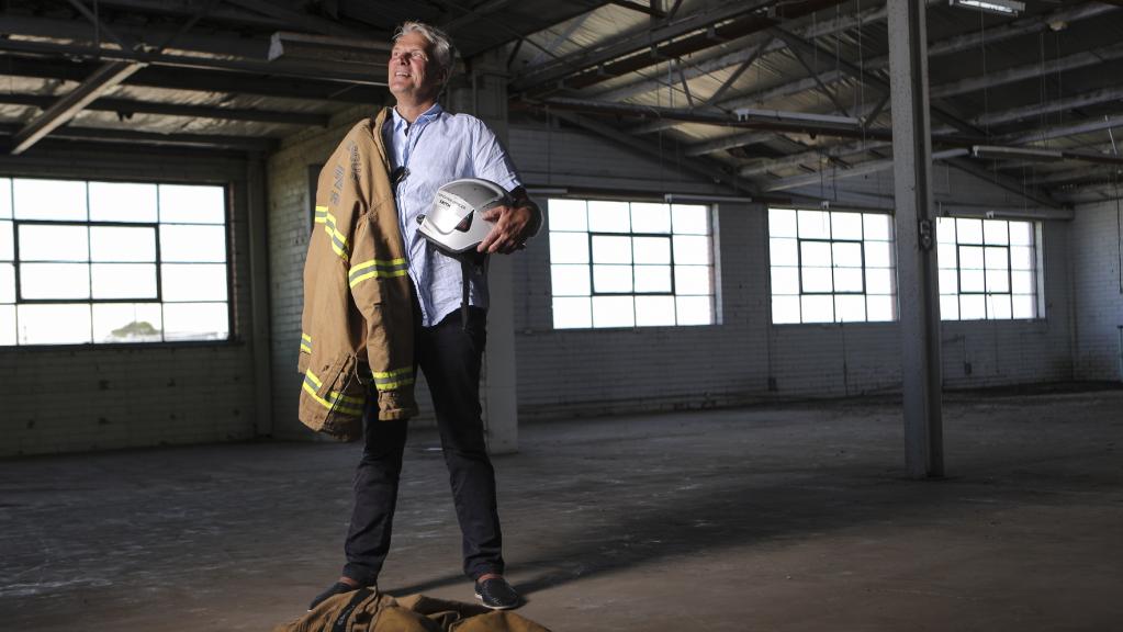 Metropolitan Fire Brigade firefighter Phillip Smith has achieved a lifelong dream, buying a former button factory with plans to convert it into an art gallery and cafe. Picture: Wayne Taylor.
