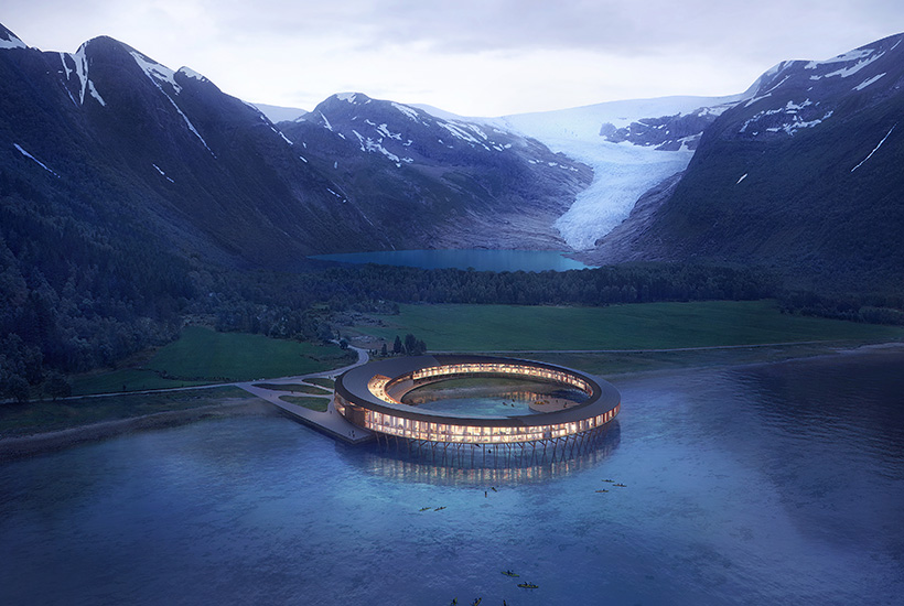 The stunning circular hotel will sit on several-metre-high wooden pools, above the Holandsfjorden fjord. 
