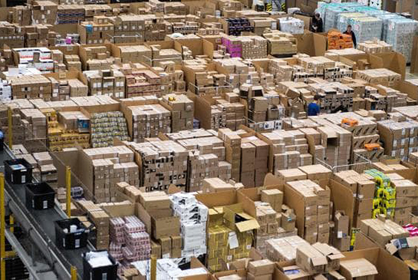 Online sales will mean a growing shift to robot-driven warehouses. Pic: AFP.