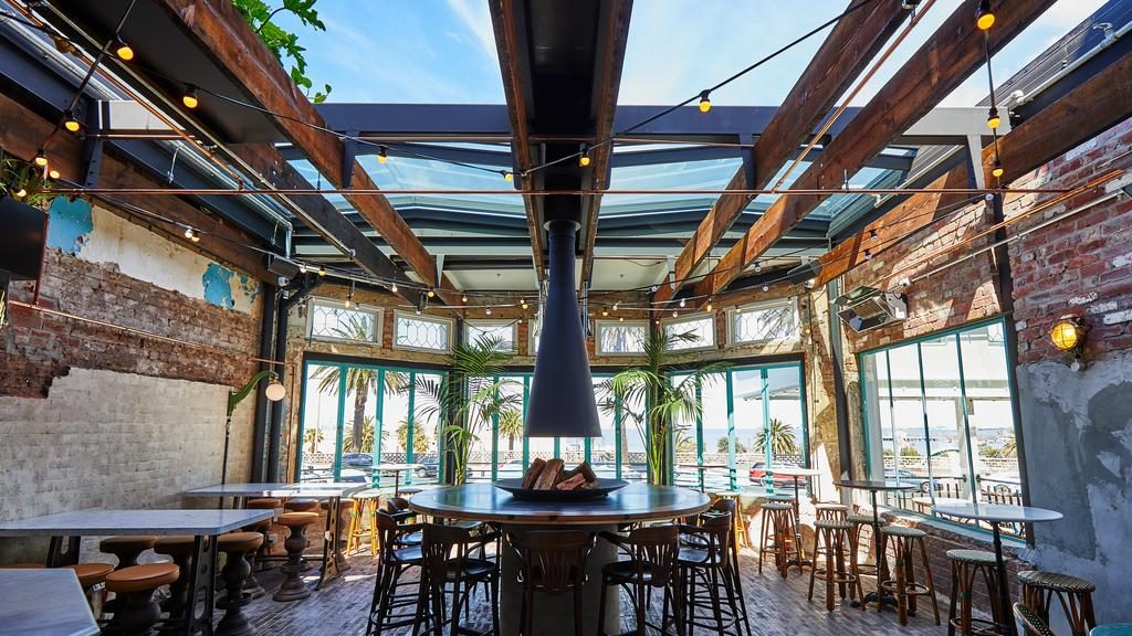 The Espy’s striking new beer garden, featuring a retractable glass roof and ocean views.
