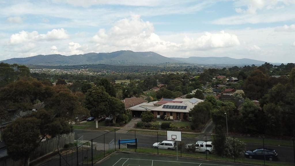 The site comes with plans for four three-bedroom houses which will offer views of the Dandenong Ranges.
