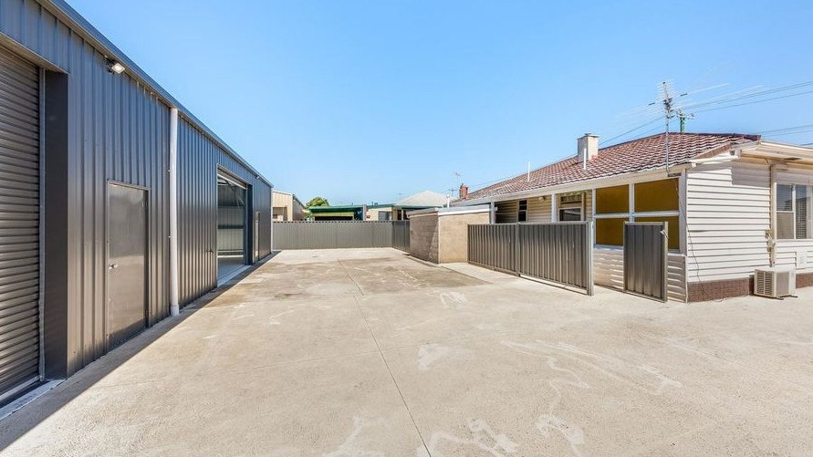 48 Roseneath St, North Geelong, has a house and two industrial sheds. It goes to auction on March 30.
