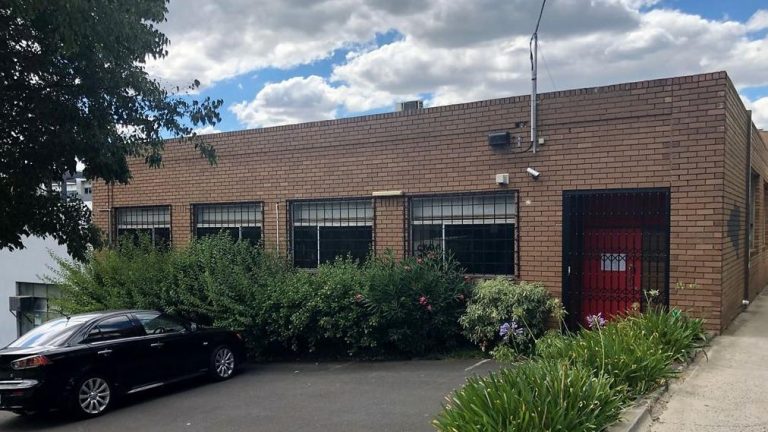 Former Melbourne Knights coach boots Hawthorn East property