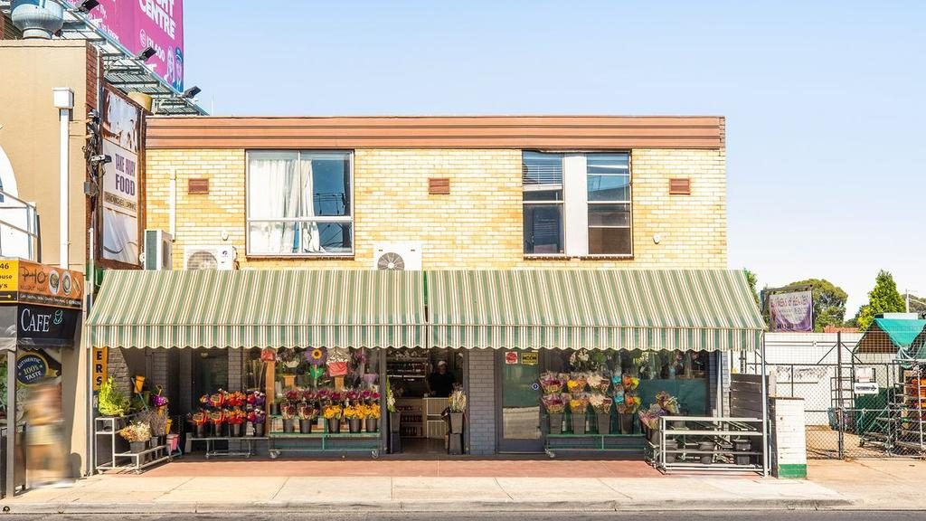 Flowers of Heaven, the upstairs apartment and house at the back of the shop have a $1.3-$1.4 million price tag.
