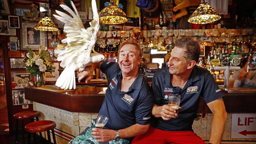 Publican brothers Michael and Peter Byrnes (right) along with cockatoo “George” have sold their Friend in Hand pub in Glebe, as the inner west sees big changes in the pub industry. Picture: Sam Ruttyn.
