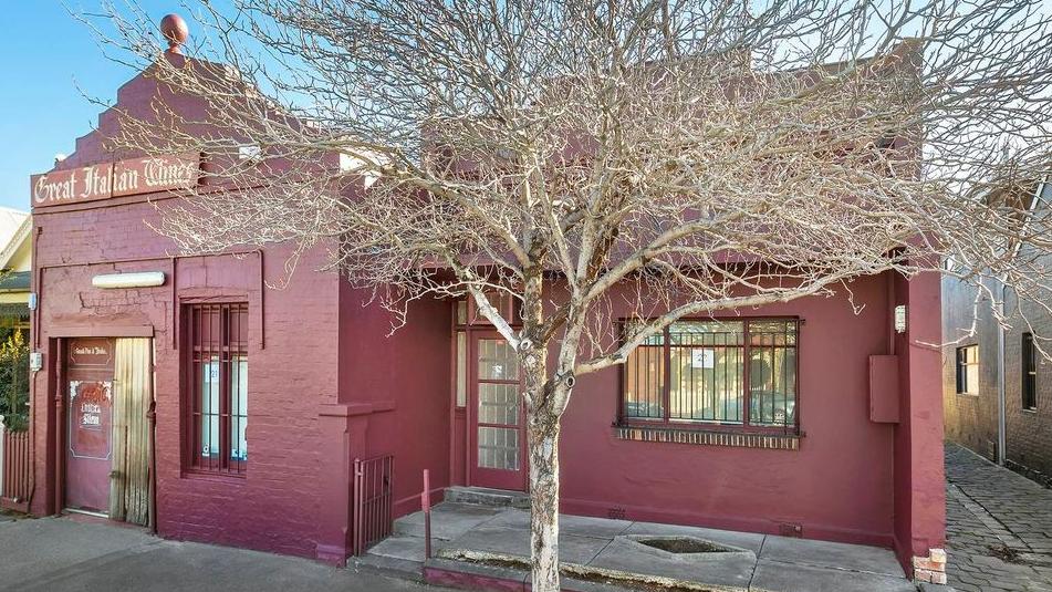 A wine coloured facade with half a century of history behind it.
