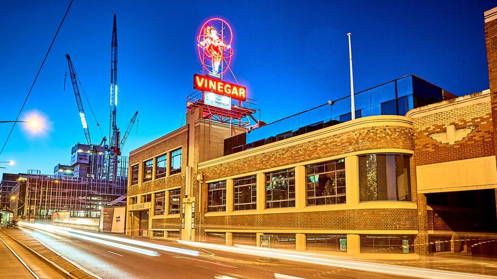 Skipping Girl Vinegar sign site up for grabs