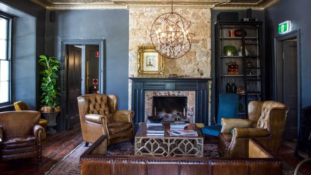 An interior view of the fireplace at The Sir George Hotel.