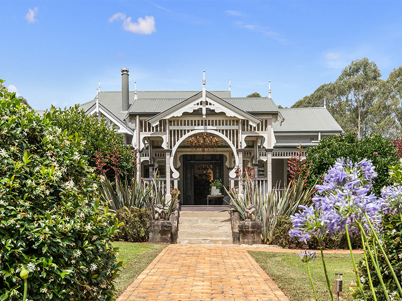 Yarraga Homestead features a 1907-built four-bedroom home and a charming cottage set amidst 34ha of stunning gardens. Picture: First National Byron
