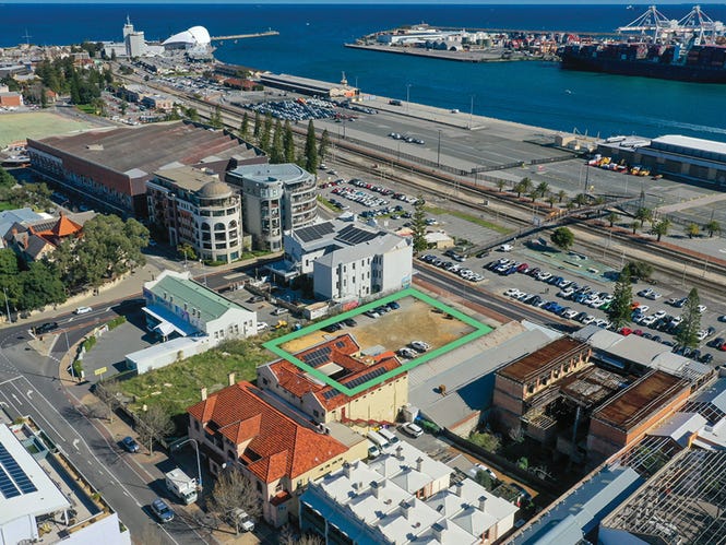 The prime development site looks over Fremantle port and out across the Indian Ocean.  Picture: realcommercial.com.au/for-sale
