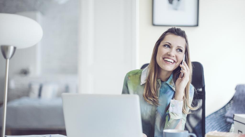Portrait of a content, smiling young woman