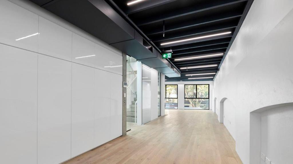 The first three levels are leased for commercial offices.