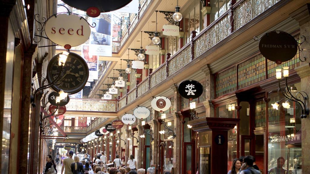 Sydney, Australia - October 26, 2013: The Strand arcade in Sydney CBD, with various people shopping and sitting down having a meal or a drink.