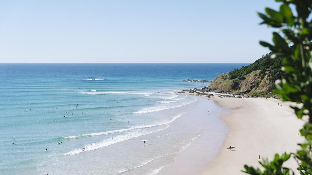 Surfing on a sunny day in Byron Bay