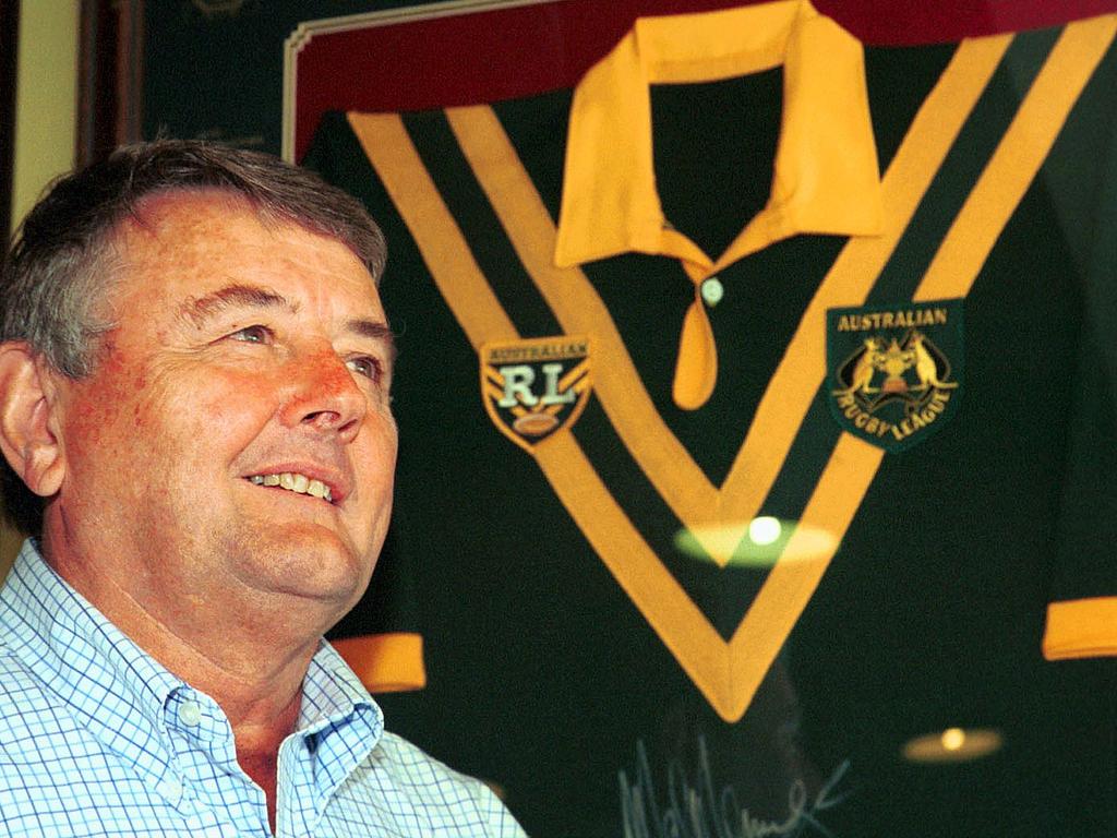 Arthur 'Spike' Laundy in Spikes Bar in front of a jersey worn by Mal Meninga . Arthur an OAM recipient on Australia Day 2004 . 22/1/04 pic Nick Bloukos