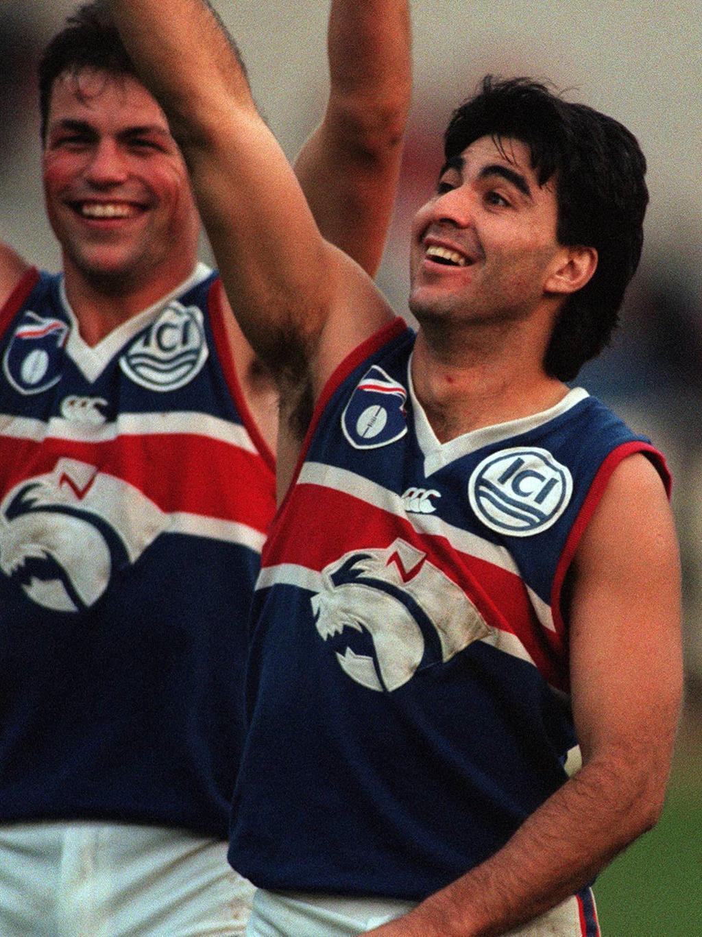 Essendon v Western Bulldogs. Brad Johnson (left) and Jose Romero enjoying their team's victory.