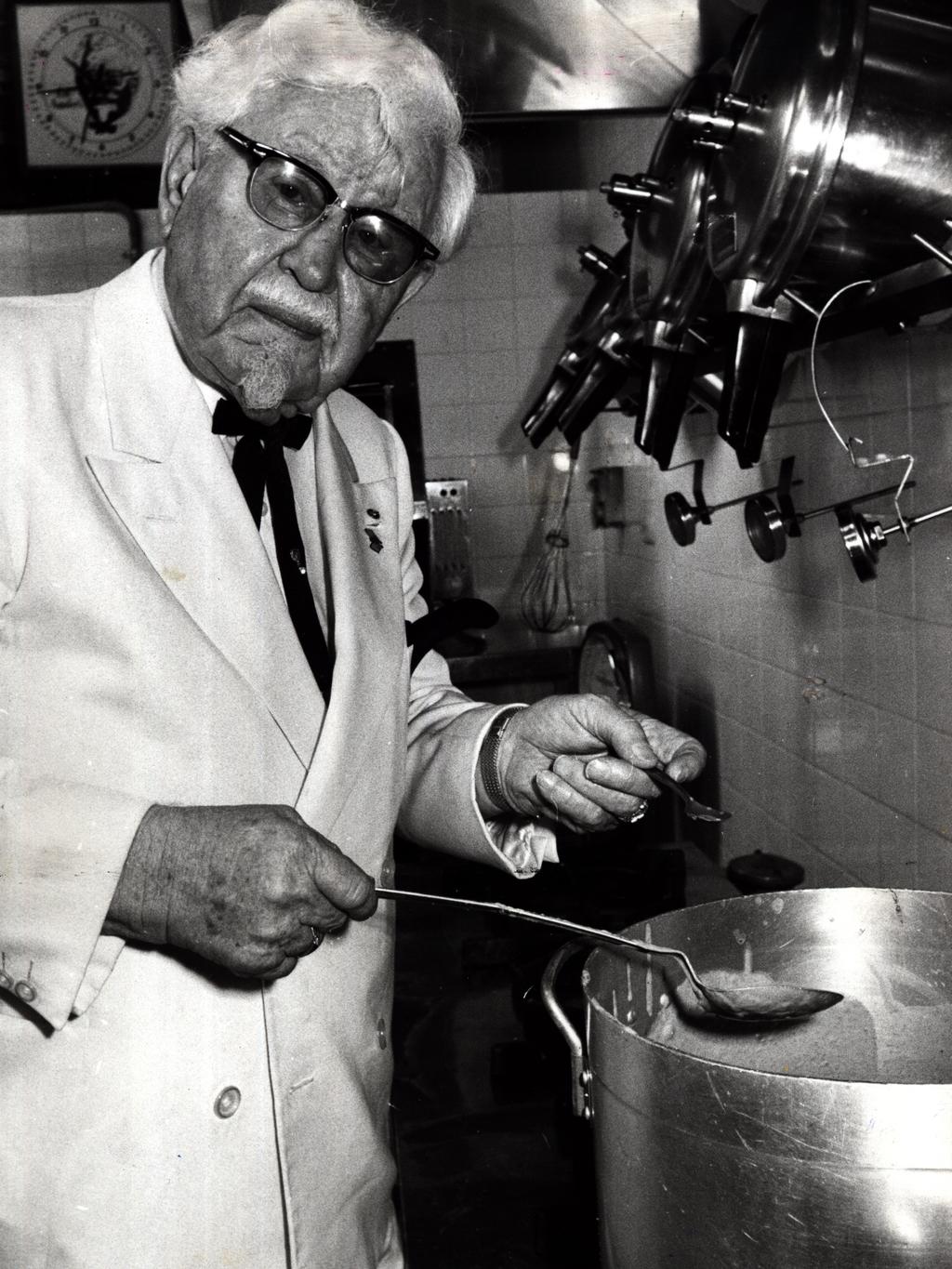 Kentucky Fried Chicken founder Colonel Harland T Sanders, mixes gravy in the Military Road, Mosman KFC store in Sydney on 17/02/1976 during his visit to Australia. Pic Gary Graham.