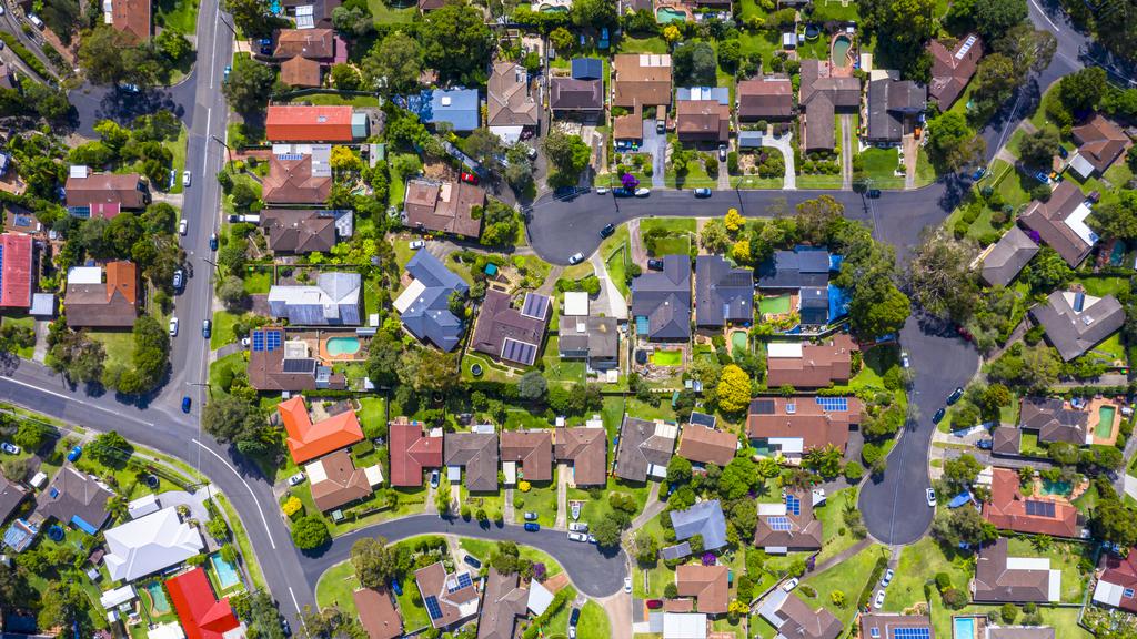 Aerial view of Suburban roof tops directly above