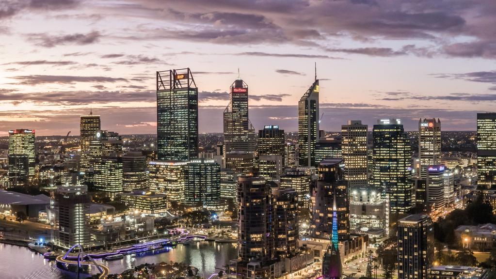 Aerial high angle drone view of Perth's CBD skyline with Elizabeth Quay in the foreground. Many mining companies are headquartered in Perth.
