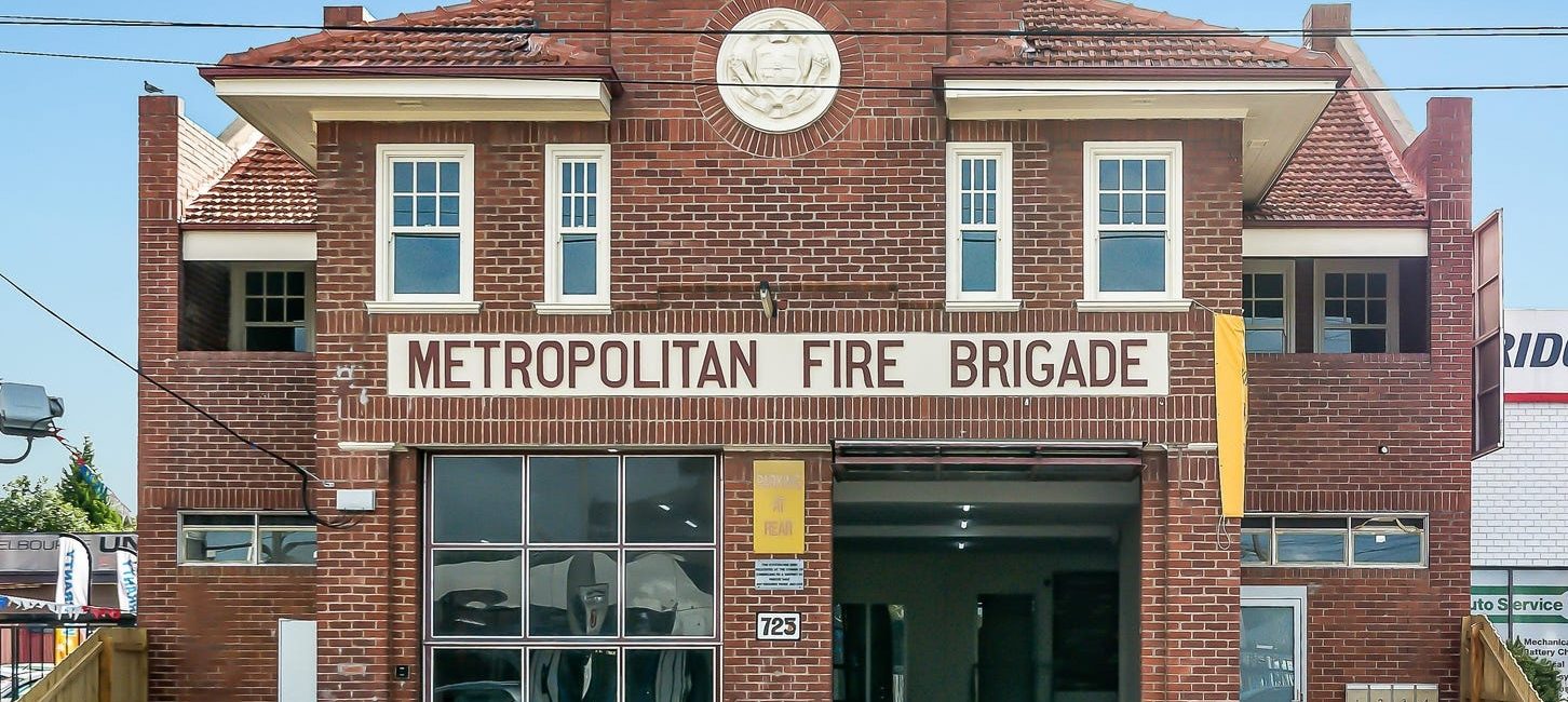 This former fire station converted into an eight-unit apartment block is going to auction with a $3.9-$4.29m price guide. Picture: realcommercial.com.au
