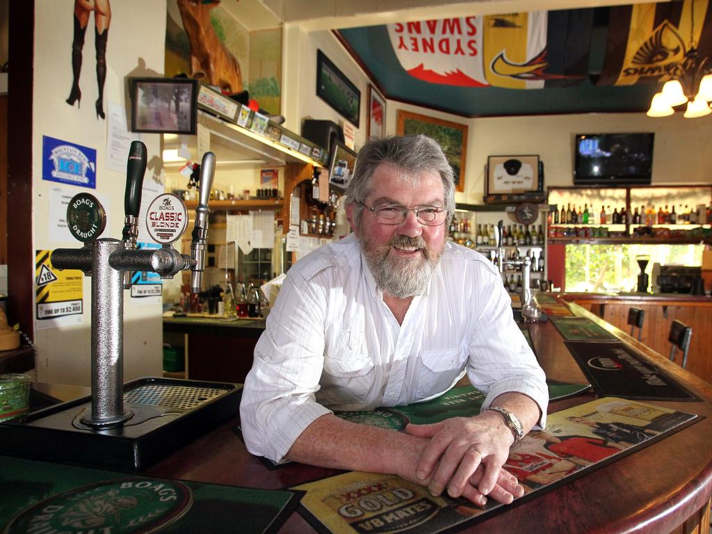 Saturday Magazine, Tasmania's historical country hotels, the Mole Creek Hotel built in 1907, owned by Doug Westbrook and Ramona Westbrook, Doug Westbrook behind the bar known as the Tassie Tiger bar