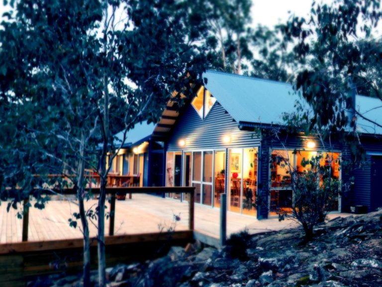Central Highlands secluded lakeside lodge with helipad listed