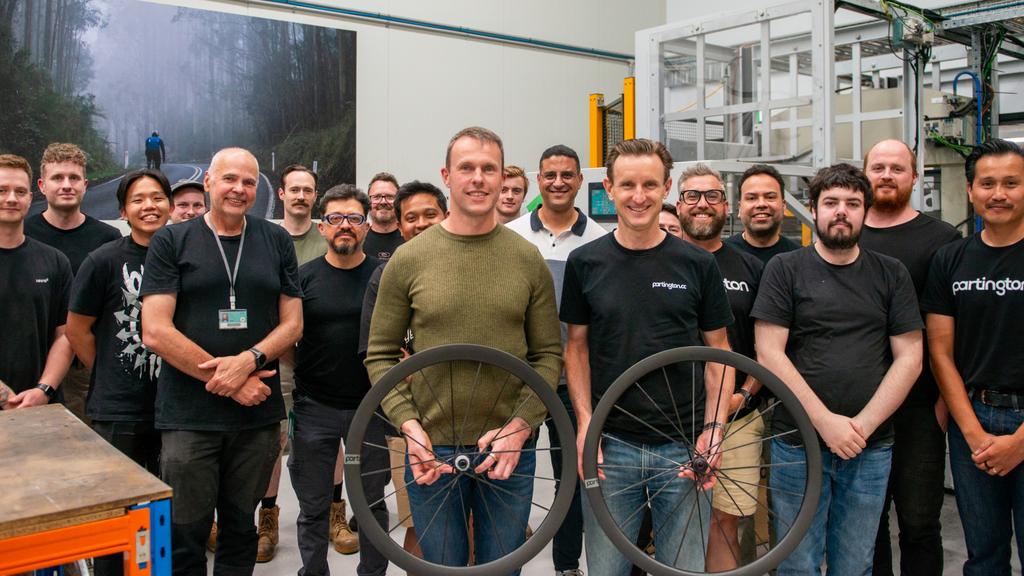 Supplied Editorial Partington CC founder Jon Partington (middle) with his team. Picture: supplied
