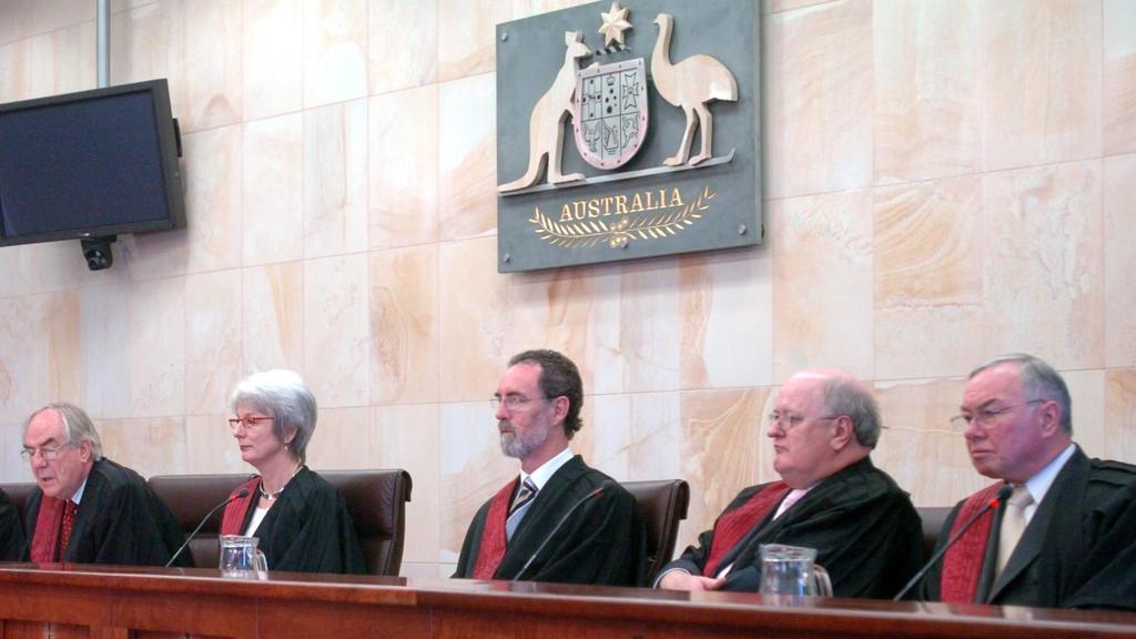 The first sitting of the Federal court in the new Commonwealth Law Courts. The Federal court judges are(l/r) Justices Roger Gyles, Arthur Emmett, Paul Finn, Donnell Ryan, Chief Justice Michael Black, Justices Catherine Branson, John Mansfield and Bruce Lander.