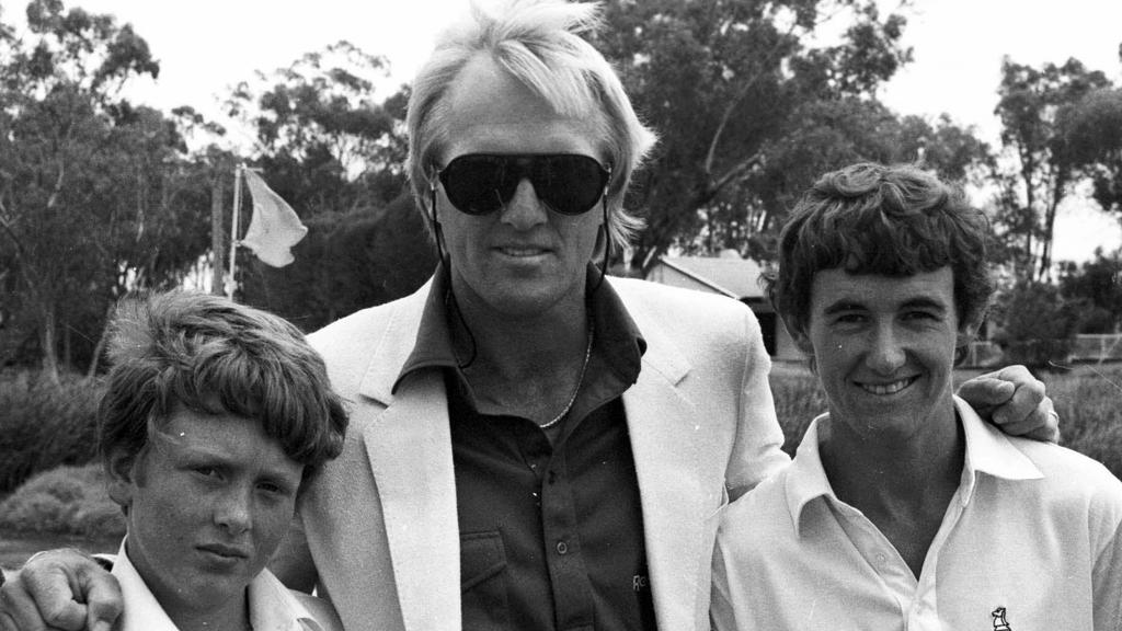 Golfer Greg Norman with Mark Hensby (R) at 16yrs at the Longyard Golf Course in Tamworth Feb 1988 and Nick Taylor (L). PicAndrew/Darby headshot sport sunglasses