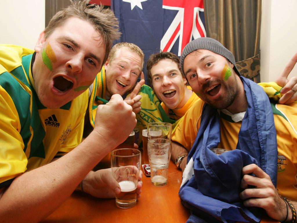 Australian fans Rodney Chapman, James Swift, Brad Swift & Daniel Scow at Sydney's Agincourt Hotel to watch Australia v Japan 2006 World Cup soccer game in Kaiserslautern, Germany.