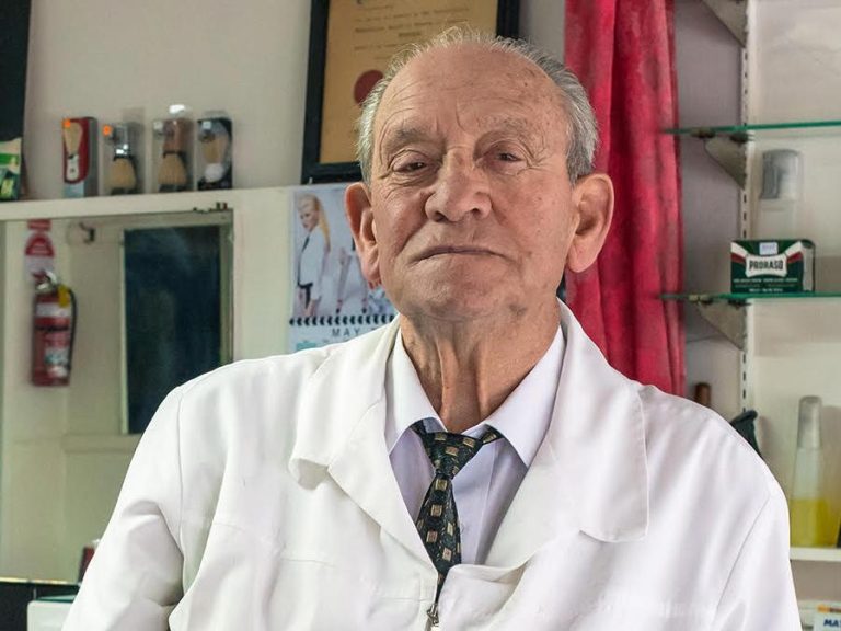 Barber in Melbourne’s west says farewell after six decades