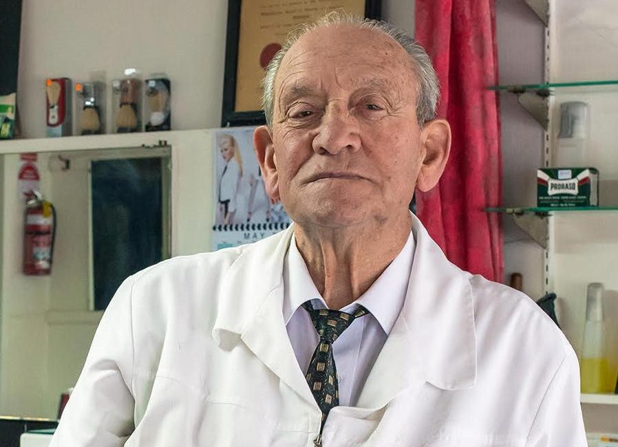 Barber in Melbourne’s west says farewell after six decades