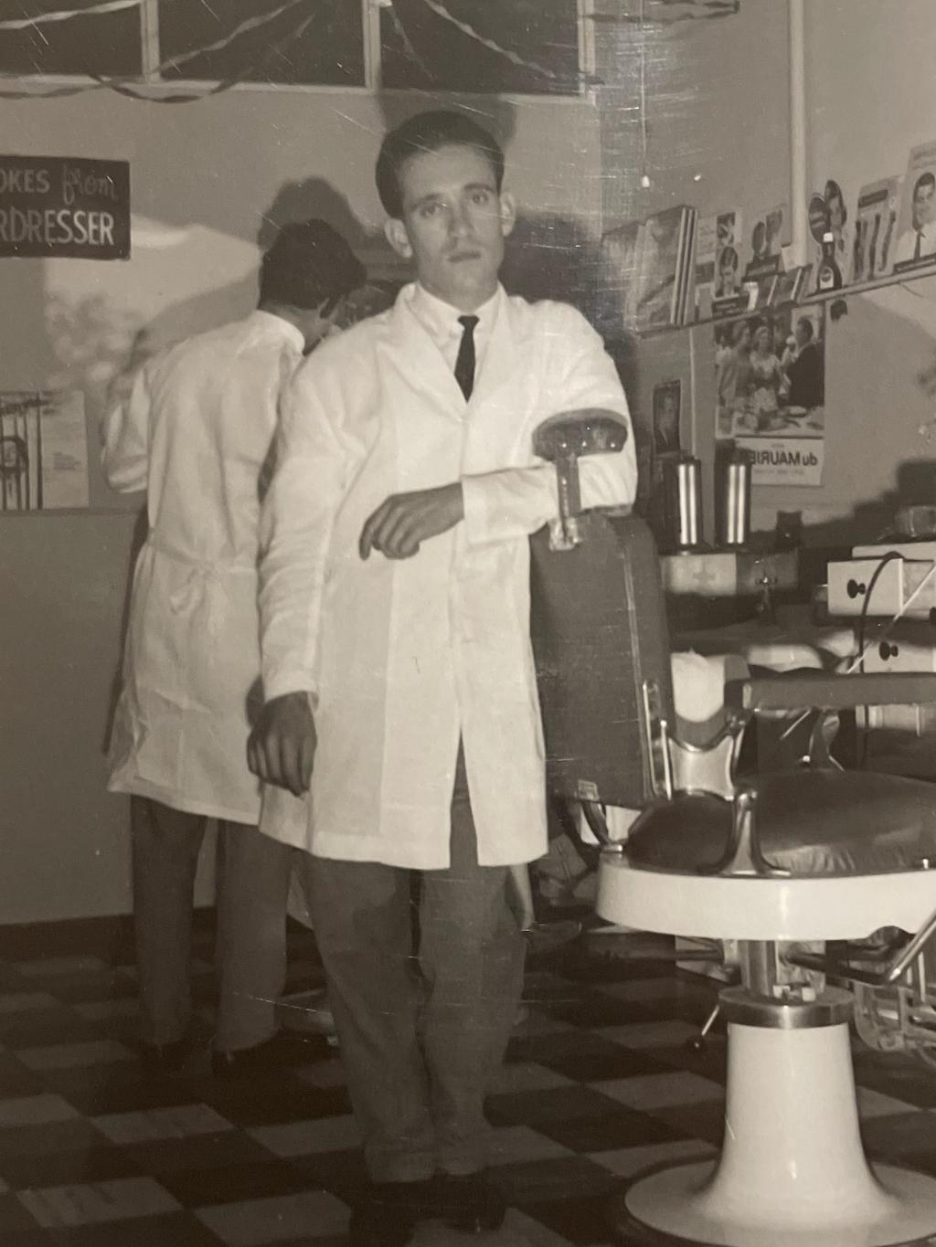 Now retired barber Raffaele Mucilli in his barbershop, Sunshine - for herald sun real estate