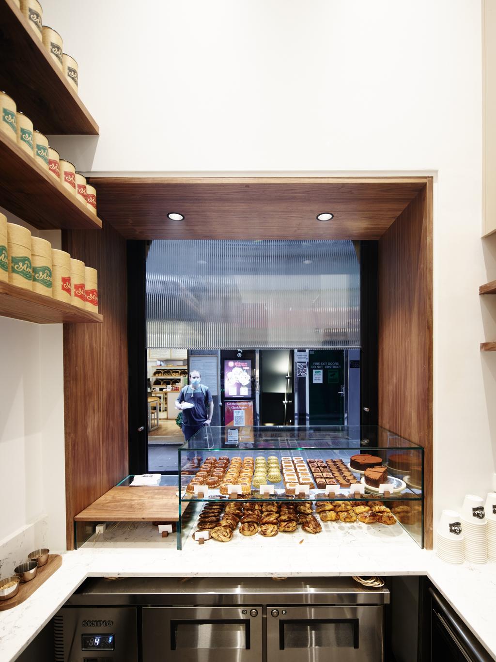 Mork hot chocolate and cake shop built into an old lift shaft - for herald sun real estate