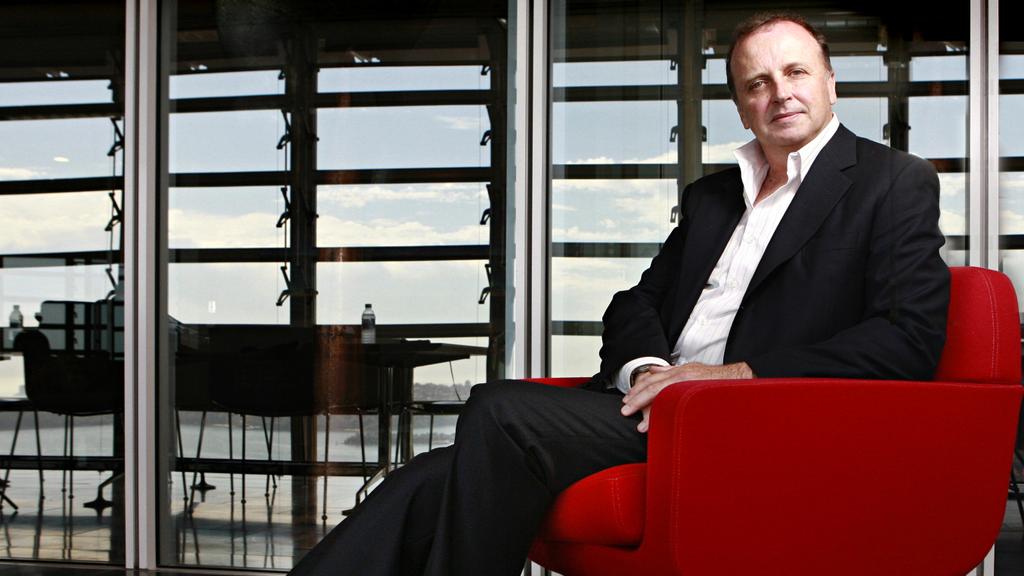 October 27, 2008: Sydney, NSW. Chairman of K Capital, David Kingston, during a photo shoot for an article in The Deal Magazine, published on 21/11/2008. Keywords: australian magazine archives / tdm / kda / portraits / finance / investment company / posing / sitting / offices / full length / alone