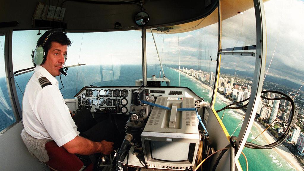Pic Paul/Riley - 01 Jun 1997.... Whitman's airship chief pilot Mike Nerandzic flying over Surfers paradise. alone headshot aviation airships flight deck interior 35/D/12700-12703