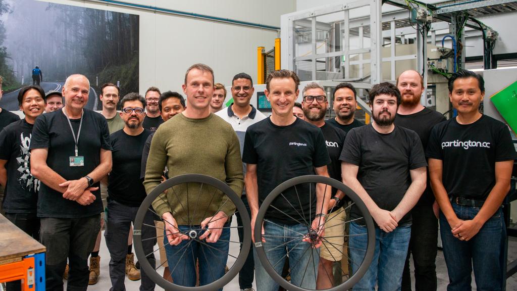 Supplied Editorial Partington CC founder Jon Partington (middle) with his team. Picture: supplied