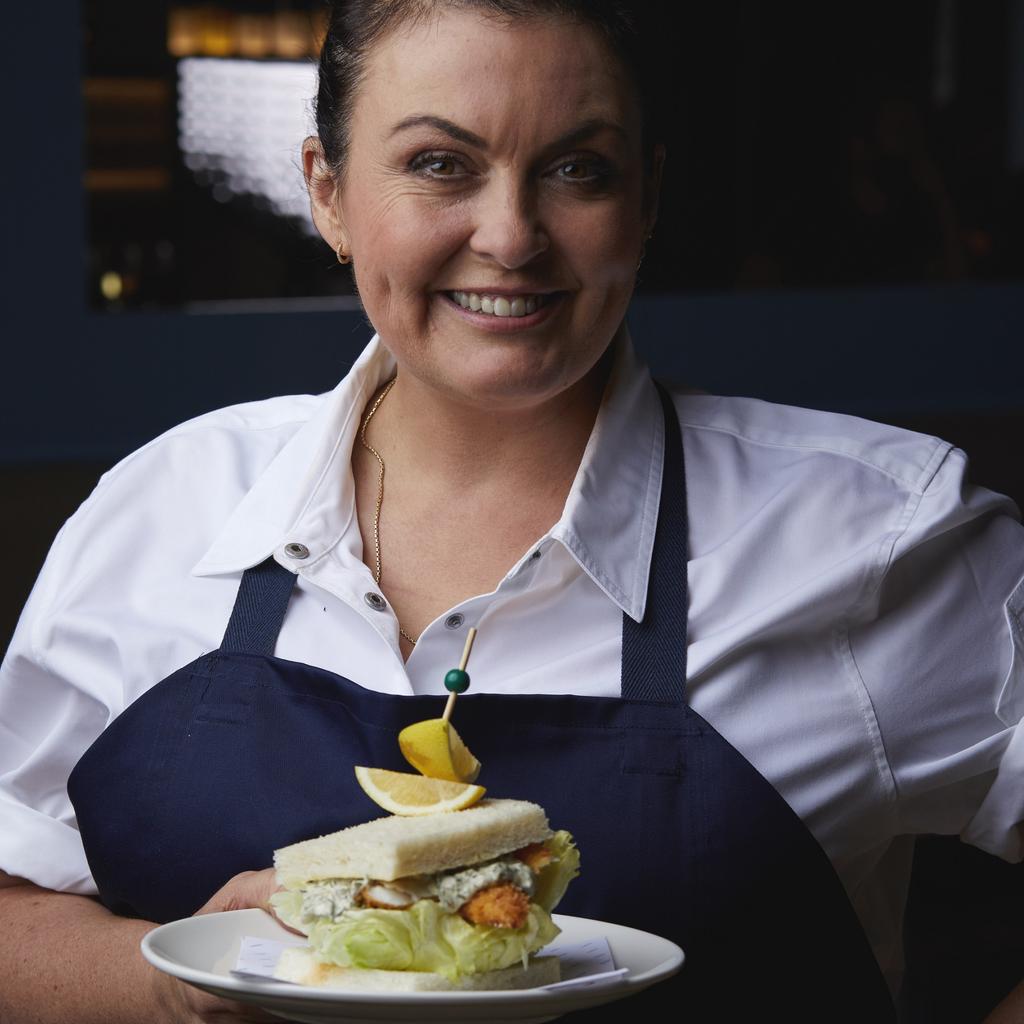 Supplied Editorial Karen Martini with fish finger sandwich at ACMI's Hero. Picture: Pete Tarasiuk