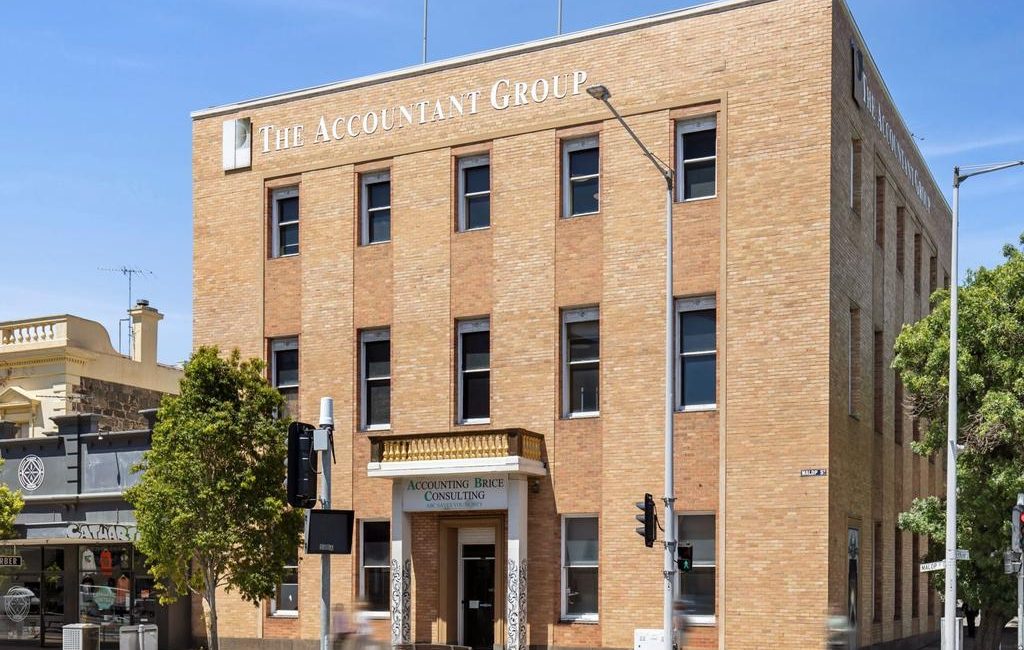 Historic Geelong bank building with hidden stone facade sells